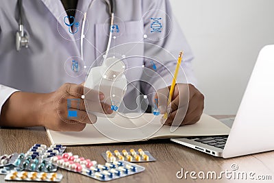 Medical doctor writing prescription physician with stethoscope prescribing treatment Stock Photo