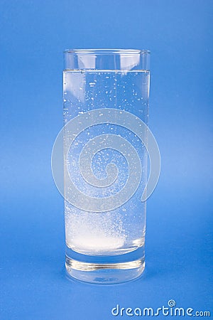 Medical - an effervescent tablet in the glass of water Stock Photo