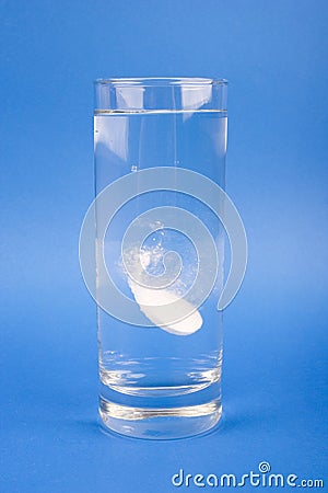 Medical - an effervescent tablet in the glass of water Stock Photo