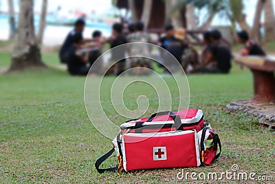 Medical emergency tool bag or first aid kit with people who resc Stock Photo