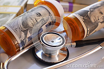 Medical Expenses Concept With Money Wrapped Around Prescription Bottles High Quality Stock Photo