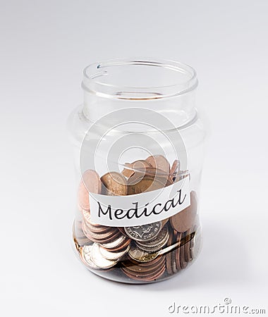 Medical expenses saving in a jar Stock Photo