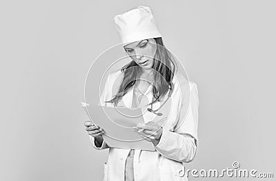 Medical history prescription. Woman work at clinic. Doctor with stethoscope at hospital. Girl with folder. Medical Stock Photo