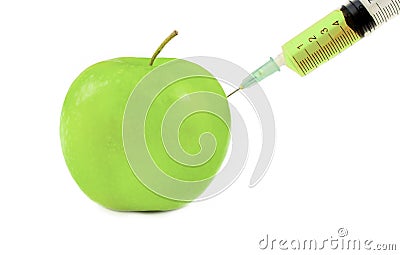 Medical injection with liquid and a green apple Stock Photo