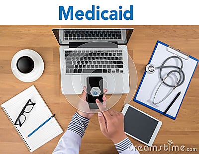 Medical insurance and Medicaid and stethoscope. Stock Photo