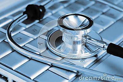 Medical Laptop and stethoscope Stock Photo