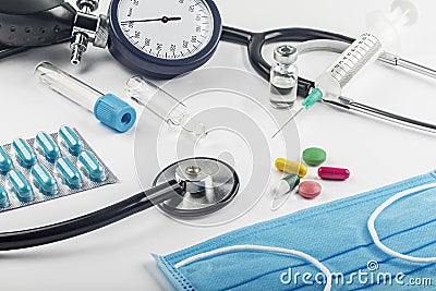 Medical mask doctor syringe pills stethoscope Stock Photo