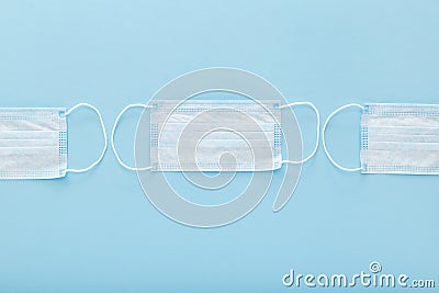 Medical mask, Medical protective masks on blue background. Disposable surgical face mask cover the mouth and nose. Healthcare and Stock Photo