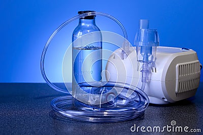 Medical nebulizer for the treatment of bronchitis. Camera agains Stock Photo