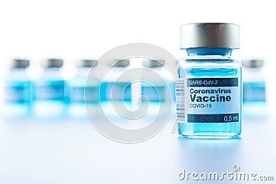 Medical needle bottles. Medical syringe with needle for protection flu virus and coronavirus. Covid vaccine isolated on white. Stock Photo