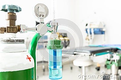 Medical oxygen flow meter shows low oxygen with patient bed in hospital, Equipment medical Oxygen tank and Cylinder for care a Stock Photo