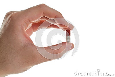 Medical pill in hand Stock Photo