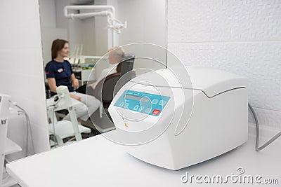 medical plasma centrifuge for the plasmolifting procedure in a dental clinic. against the background of a doctor and a Stock Photo