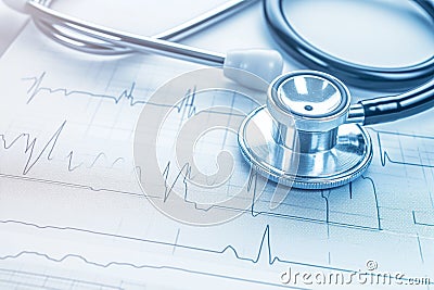 Medical precision Stethoscope laid on a heart monitor printout Stock Photo