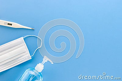 Medical protective supplies on blue background with copy space Stock Photo