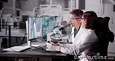 Medical Research Scientist Conducting Blood Sample Test Stock Photo