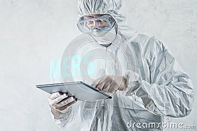 Medical Scientist Reading About MERS Virus on Figital Tablet Com Stock Photo
