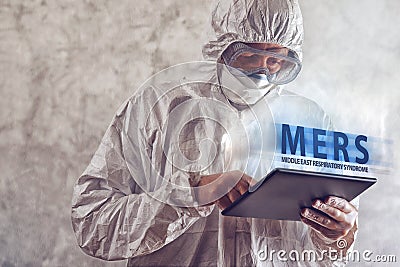 Medical Scientist Reading About MERS Virus on Figital Tablet Com Stock Photo