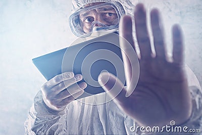 Medical Scientist Reading About MERS Virus on Figital Tablet Com Stock Photo