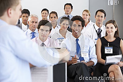 Medical Staff Seated In Circle At Case Meeting Stock Photo