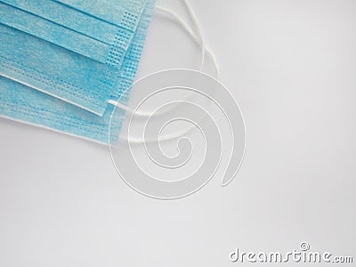 Medical sterile blue protective masks on a white background Stock Photo