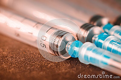 Medical Sterile Syringes Needles, Close up Syringes on wooden Background, Health care concept. Stock Photo