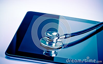 Medical stethoscope on modern digital tablet in laboratory Stock Photo