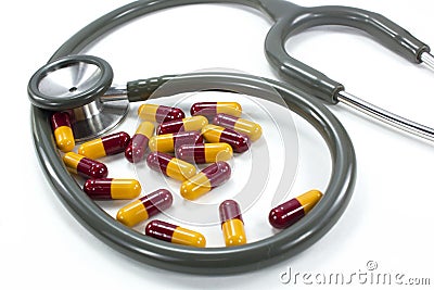 Medical Stethoscope and Pill Tablet Stock Photo