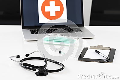Medical stethoscope, syringe and mask Stock Photo