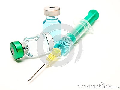 Medical syringe and phials Stock Photo