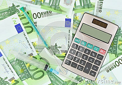 Medical syringes, calculator and euro money Stock Photo