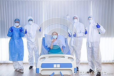 Medical team has been Victory. Doctor & nurse team just recovered patient in hospital. Stock Photo