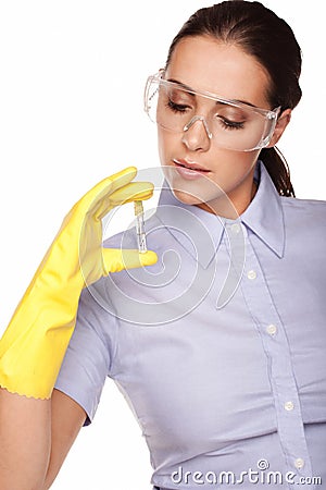 Medical technologist looking at a test tube Stock Photo