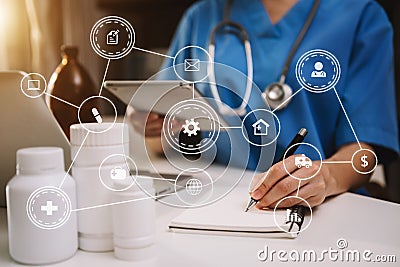 Medical technology concept,smart doctor hand working with modern laptop computer with virtual icon diagram Stock Photo