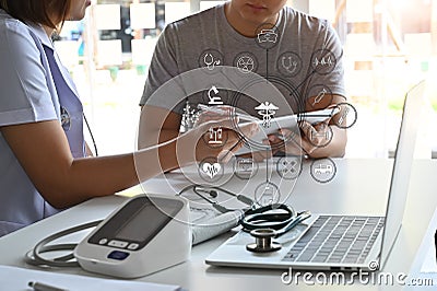 Medical technology visual icon Consult Doctor and patient are discussing. Stock Photo