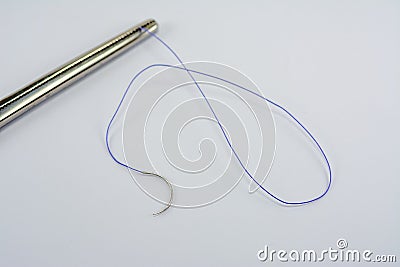 medical thread for suturing wounds, surgical needle holder, suturing in medical and dental Stock Photo