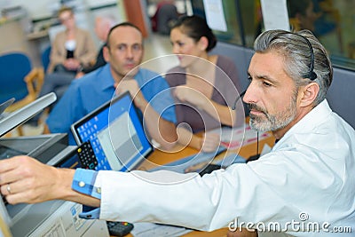 Medical transcriptionist preparing discharge Stock Photo