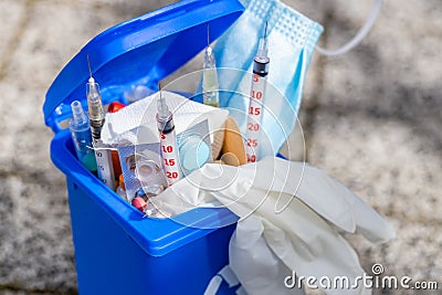 Medical waste concept, Open garbage full of pills, syringes, bandages, masks, protective gloves. Utilization and storage of Stock Photo