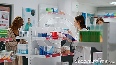 Medical worker checking pharmaceutical products and supplements Stock Photo