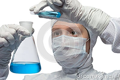 Medical worker pours liquid from a flask Stock Photo