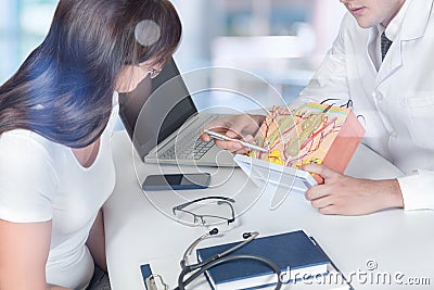 Medical worker skin anatomy model to patients Stock Photo