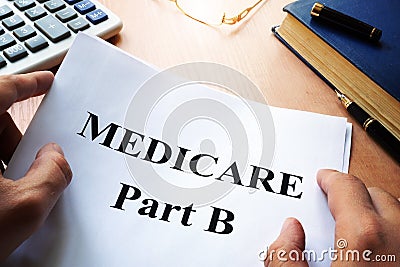 Medicare Part B on a desk. Stock Photo