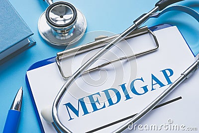 Medicare Supplement Insurance Medigap application and stethoscope. Stock Photo