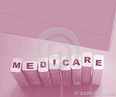 MEDICARE word made with building blocks. Medicine healthcare concept Stock Photo