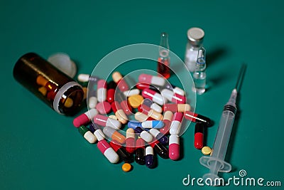 Medication capsules in an opened prescription bottle Stock Photo