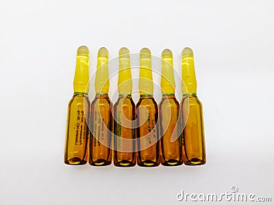 Medication and healthcare concept. Many transparent brown ampule Stock Photo
