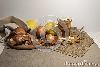 Medicinal tea made from lemon and onion peel. Stock Photo