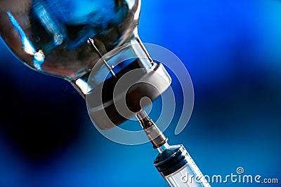 Medicine Bottle for Injection From SARS Coronavirus and Syringe For Vaccination, Medicine From 2019-nCoV Stock Photo