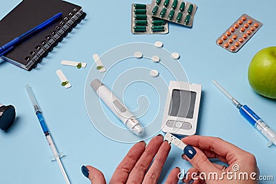 Medicine, healthcare, technology and online pharmacy concept. A diabetic measures your blood glucose Stock Photo