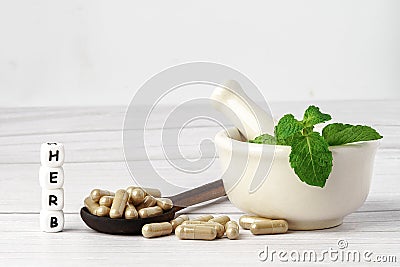 Medicine herbal capsule, vitamin, mineral, drug with herbs leaf for healthy life Stock Photo